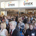 IMEX America attendees wait to get into the event's trade show in Las Vegas.