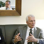 Ohio Congressman Steve Driehaus (reflected in mirror) listens as Automotive Service Association (ASA) President Ron Pyle discusses legislation during the ASA Taking the Hill Fly-In in Washington, D.C.